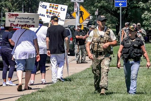 Armed militia at peaceful Missouri protests raises concerns